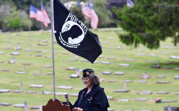 Michael S. Lockett / The Daily World File
Grays Harbor County veteran relief fund ombudsman Gwyn Tarrence, seen here speaking at a Memorial Day event, had her contract extended by the county commission on Tuesday.