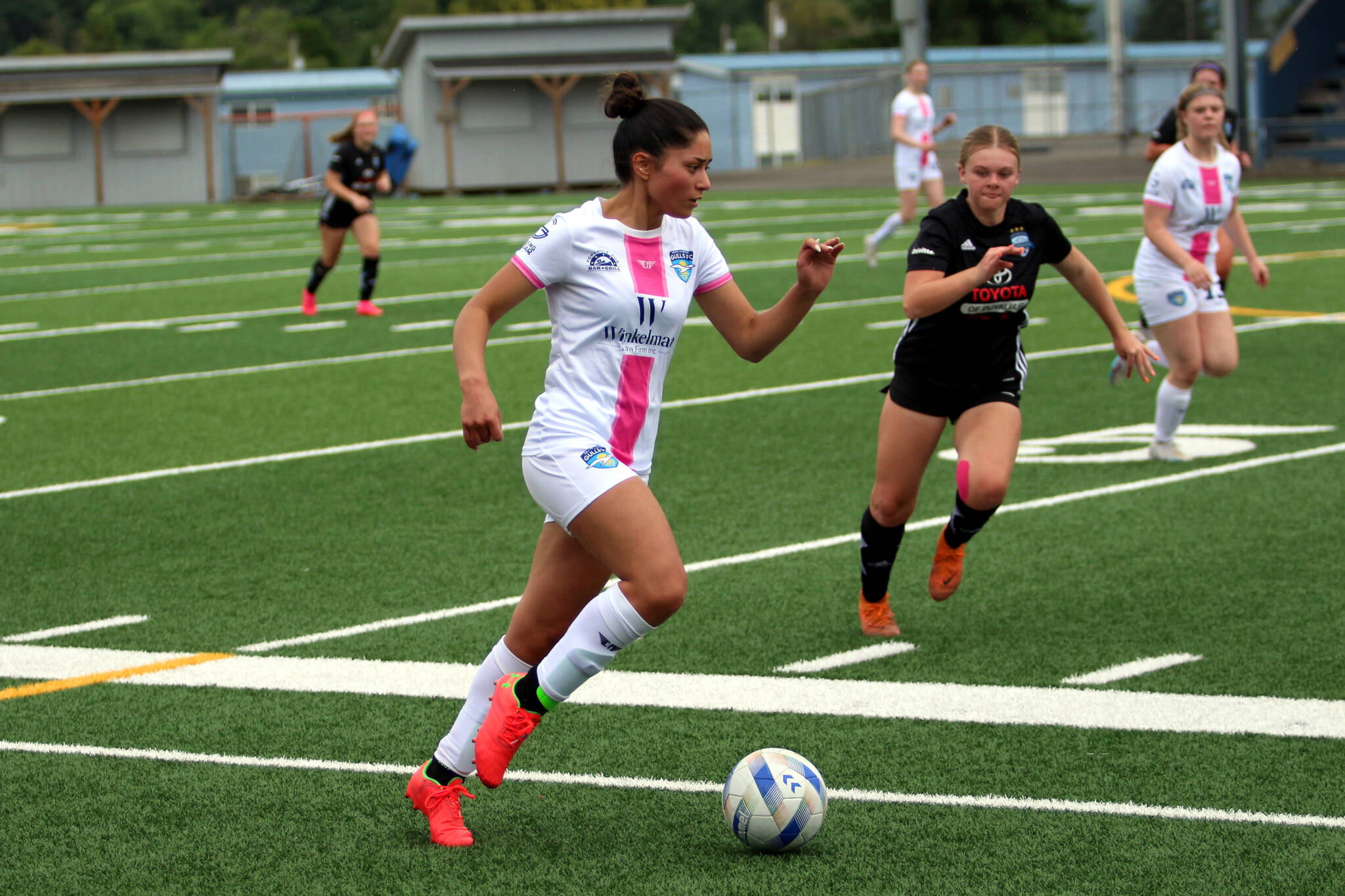 RYAN SPARKS | THE DAILY WORLD Former Aberdeen standout and Grays Harbor Gulls forward Marina Marll pushes the ball forward during a 6-0 loss to Washington Premier Legends on Saturday at Stewart Field in Aberdeen.