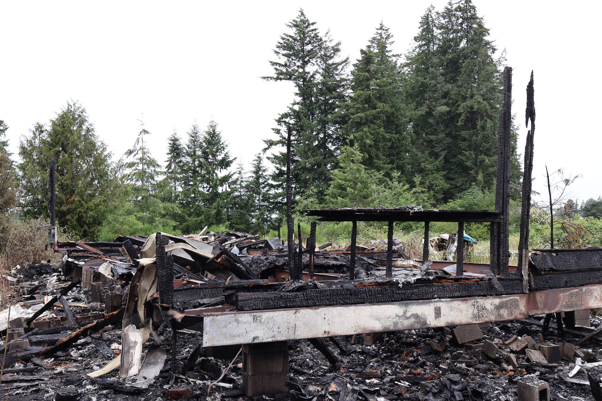 A residential trailer in Elma was completely destroyed by a fire on Tuesday. (Michael S. Lockett / The Daily World)