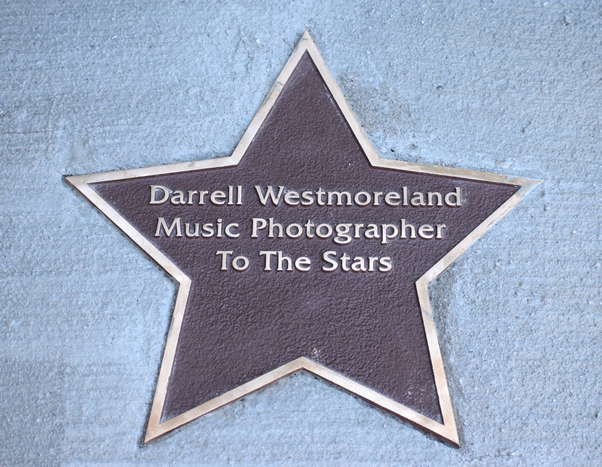 Matthew N. Wells / The Daily World
Darrell Westmoreland’s name was immortalized on the Aberdeen Walk of Fame on Saturday. The star, the only one to face outward of all 92 stars, is positioned in front of the sign for The Green Room. The Green Room is part of The Music Project, which is near the intersection of West Wishkah and South K Street.