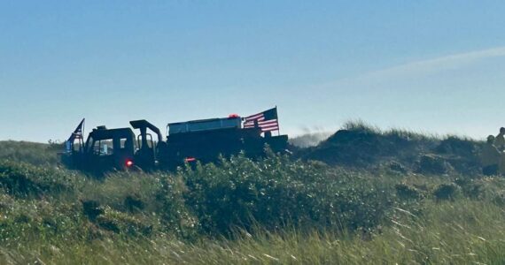 Courtesy photo / OSFD
Ocean Shores firefighters mop up after a dune grass fire on Tuesday.