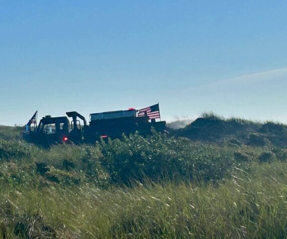 Courtesy photo / OSFD
Ocean Shores firefighters mop up after a dune grass fire on Tuesday.