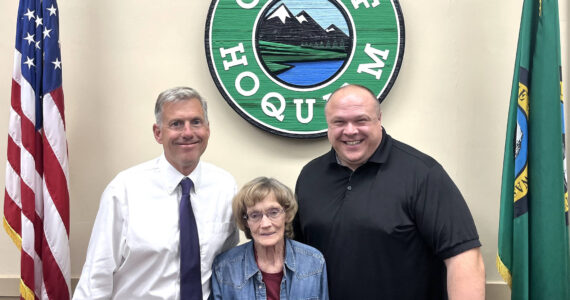 Hoquiam City Administrator Brian Shay, left, and Hoquiam Mayor Ben Winkelman, right, stand with Tracy Wood, who has served many roles with the city for 30 years. Wood is retiring from the city this week. In addition to so many projects, grants written, and other key ways she’s helped the city, Wood has served as the Hoquiam City Council secretary and the city’s community services coordinator. Anyone who would like to celebrate Wood’s retirement can do so Friday at 5:30 p.m., at 8th Street Ale House — 207 8th St., in Hoquiam. (Matthew N. Wells / The Daily World)