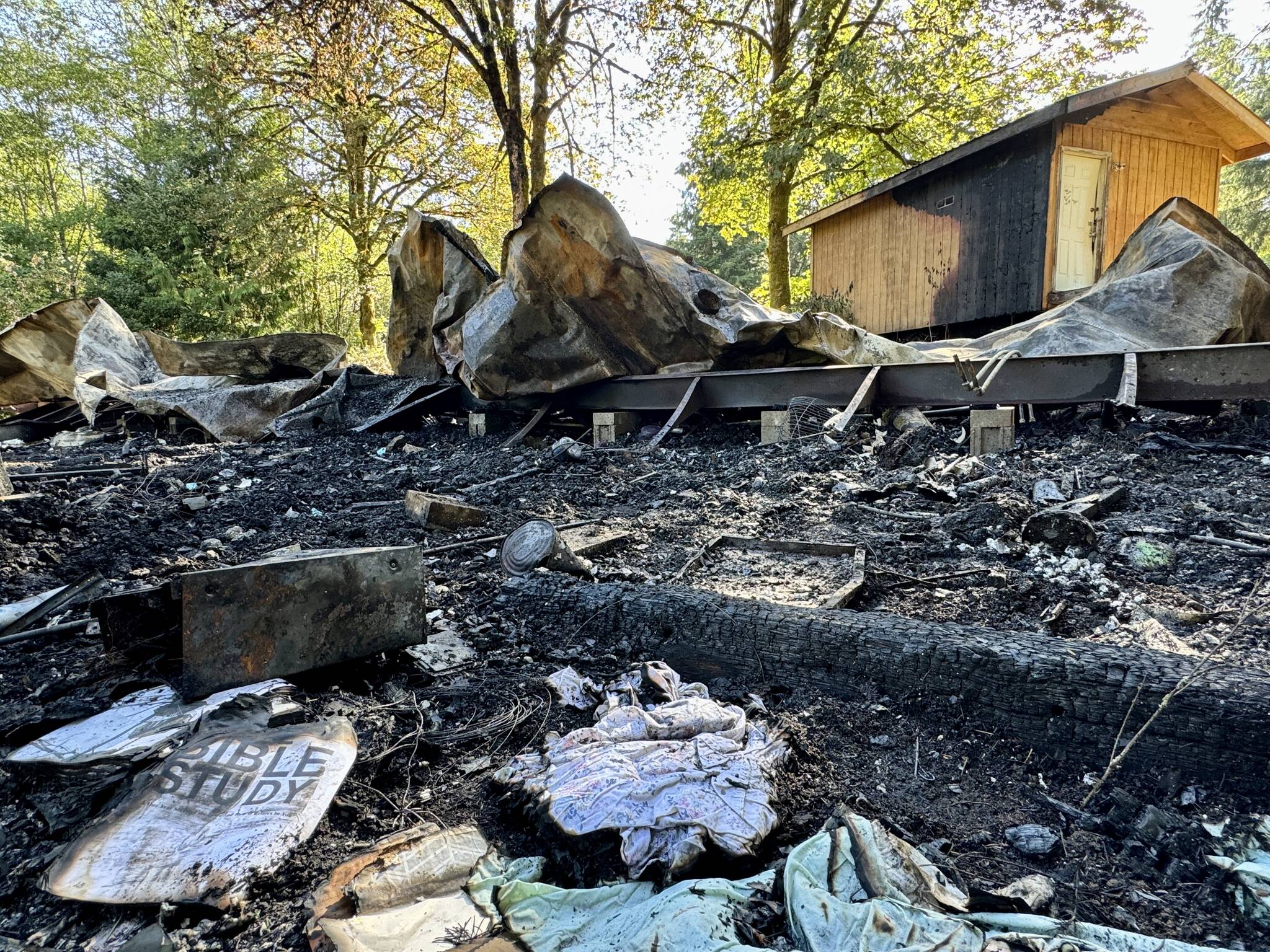 Fire destroyed a trailer near Elma on Sunday afternoon. (Michael S. Lockett / The Daily World)