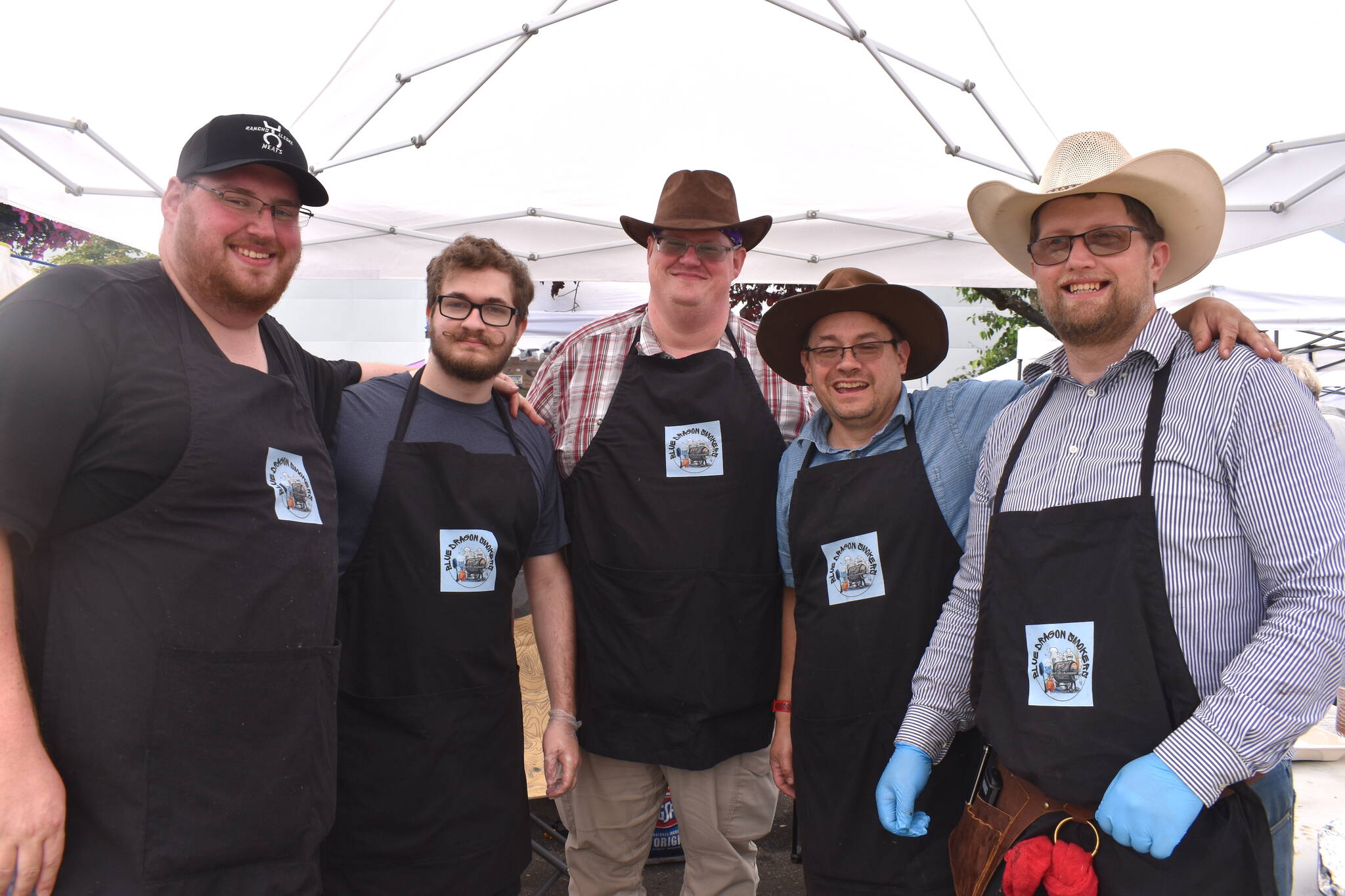 Matthew N. Wells / The Daily World
Have you heard the one about the lawyers who invaded a barbecue festival? Well, The Blue Dragon Smokers, all friends and family, won the first place prize in the chicken category at Aberdeen Summerfest on Saturday, in downtown Aberdeen. While they won some money Saturday, they were there for their love of barbecuing.