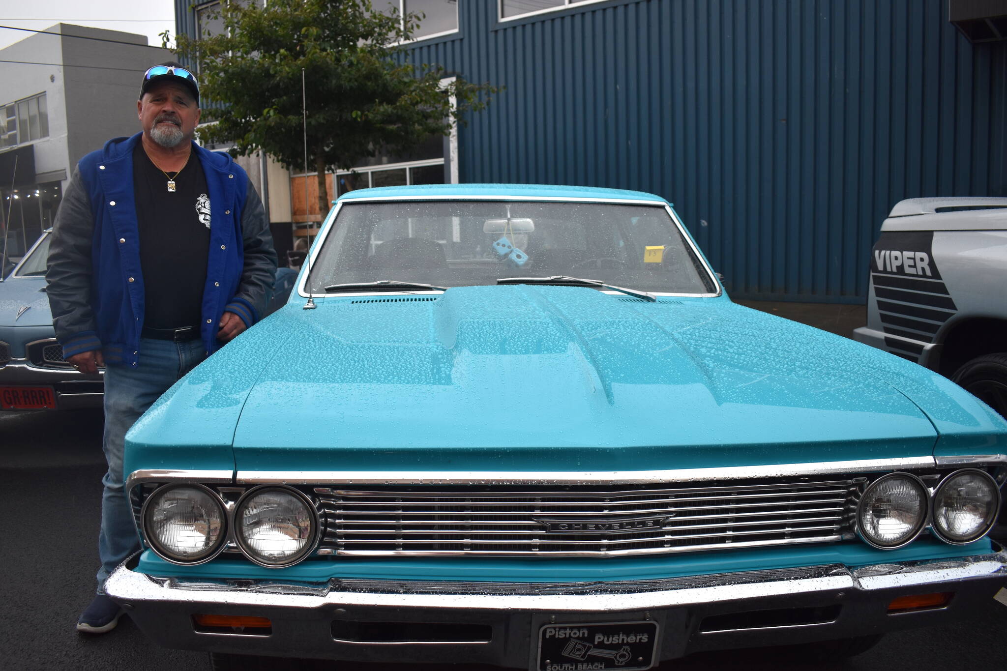 Matthew N. Wells / The Daily World
The rain on Saturday didn’t stop Doug Smith’s metal baby, a 1966 Chevrolet Chevelle 300, from shining on South Broadway Street in Aberdeen. Smith spoke about much of what he’s had to do in the last 13 years in order to bring the classic muscle car back from what seemed like its end.