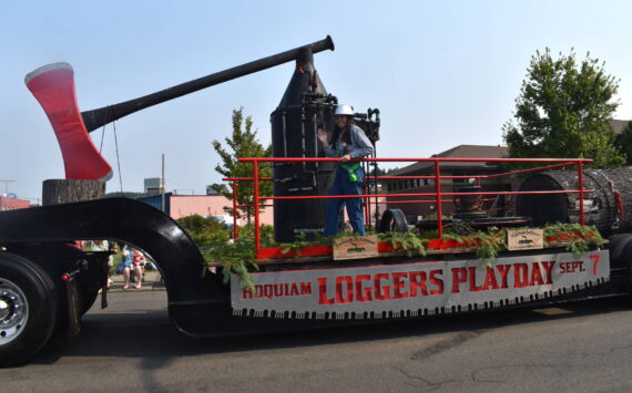 Matthew N. Wells / The Daily World
The Hoquiam Loggers Playday float heads through downtown Hoquiam in order to celebrate the 60th anniversary of the city-wide celebration on Saturday.