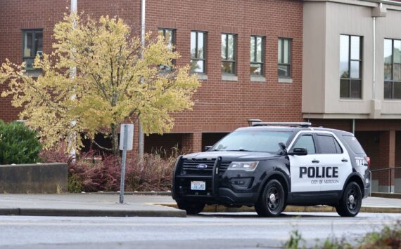 Michael S. Lockett / The Daily World
An Aberdeen police vehicle is one of the more visible components in the response after school administrators raised the security levels following a report that an unknown person was going to bring a gun to Aberdeen High School.