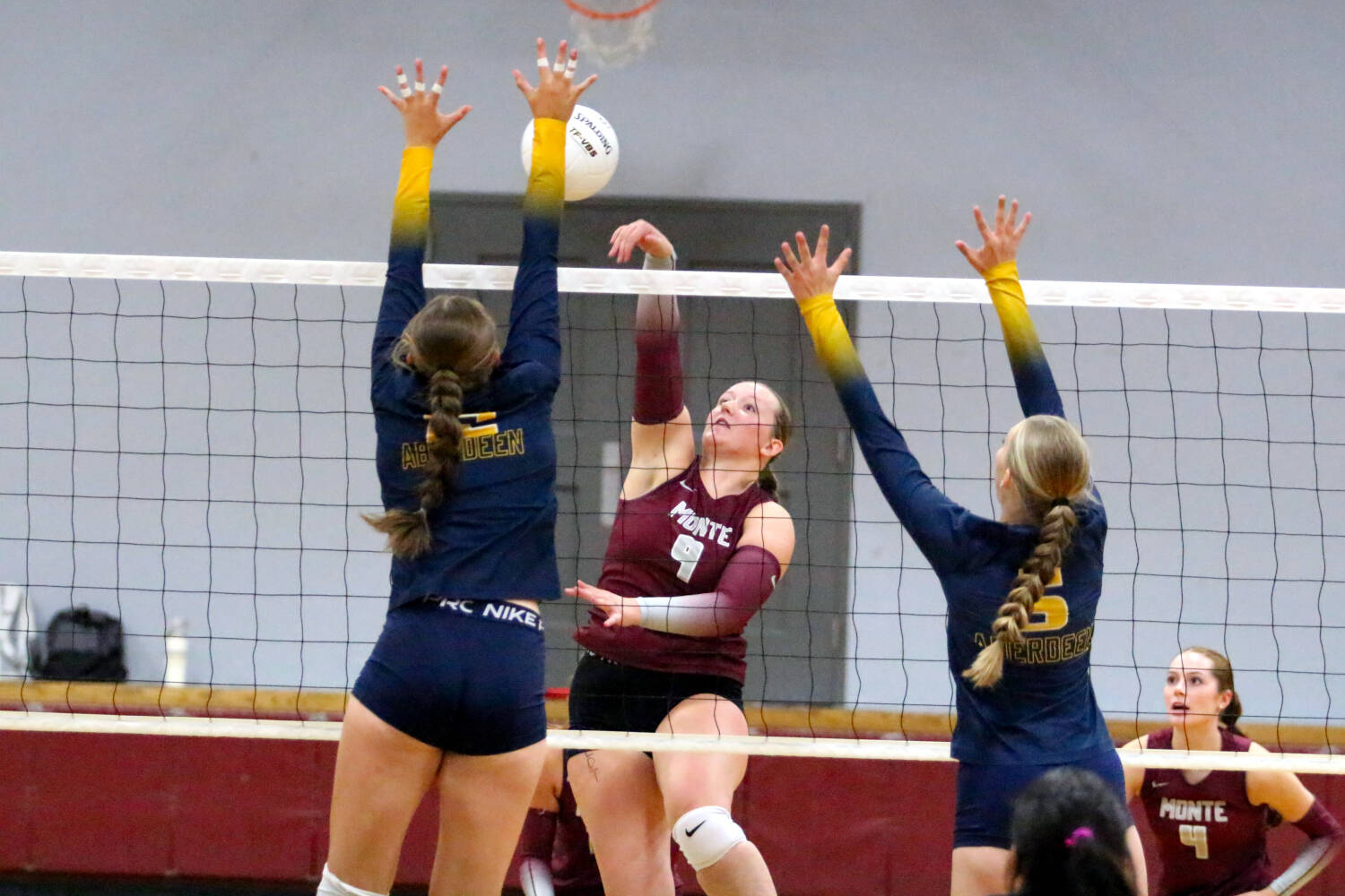 RYAN SPARKS | THE DAILY WORLD Montesano middle blocker Kylee Wisdom (9) attempts a kill during a 3-1 win over Aberdeen on Wednesday at Montesano High School.