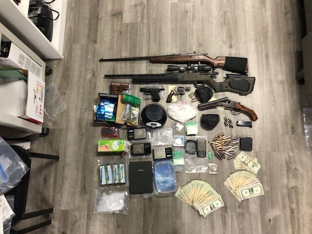 The Grays Harbor Drug Task Force seized a goodly amount of drugs, cash and multiple firearms during a raid on an Aberdeen apartment Wednesday. (Courtesy photo / GHDTF)