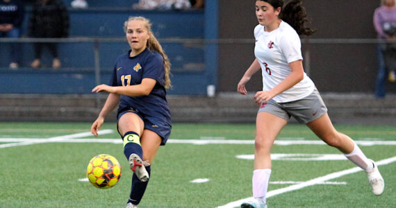 RYAN SPARKS | THE DAILY WORLD Aberdeen senior midfielder Scotlyn Lecomte (17) passes the ball while Hoquiam’s Iza Frye defends during the Bobcats’ 5-1 victory on Thursday at Stewart Field in Aberdeen.