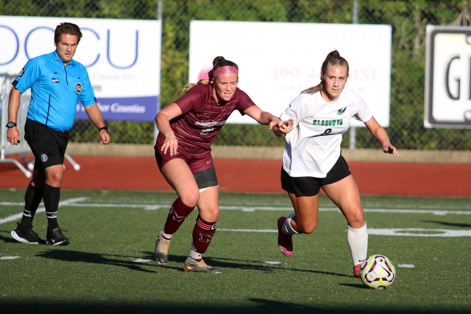 RYAN SPARKS | THE DAILY WORLD Montesano’s Kennedy Campbell (left) pursues Klahowya’s Macayla Wrataric during the Bulldogs’ 3-0 loss on Thursday at Montesano High School.