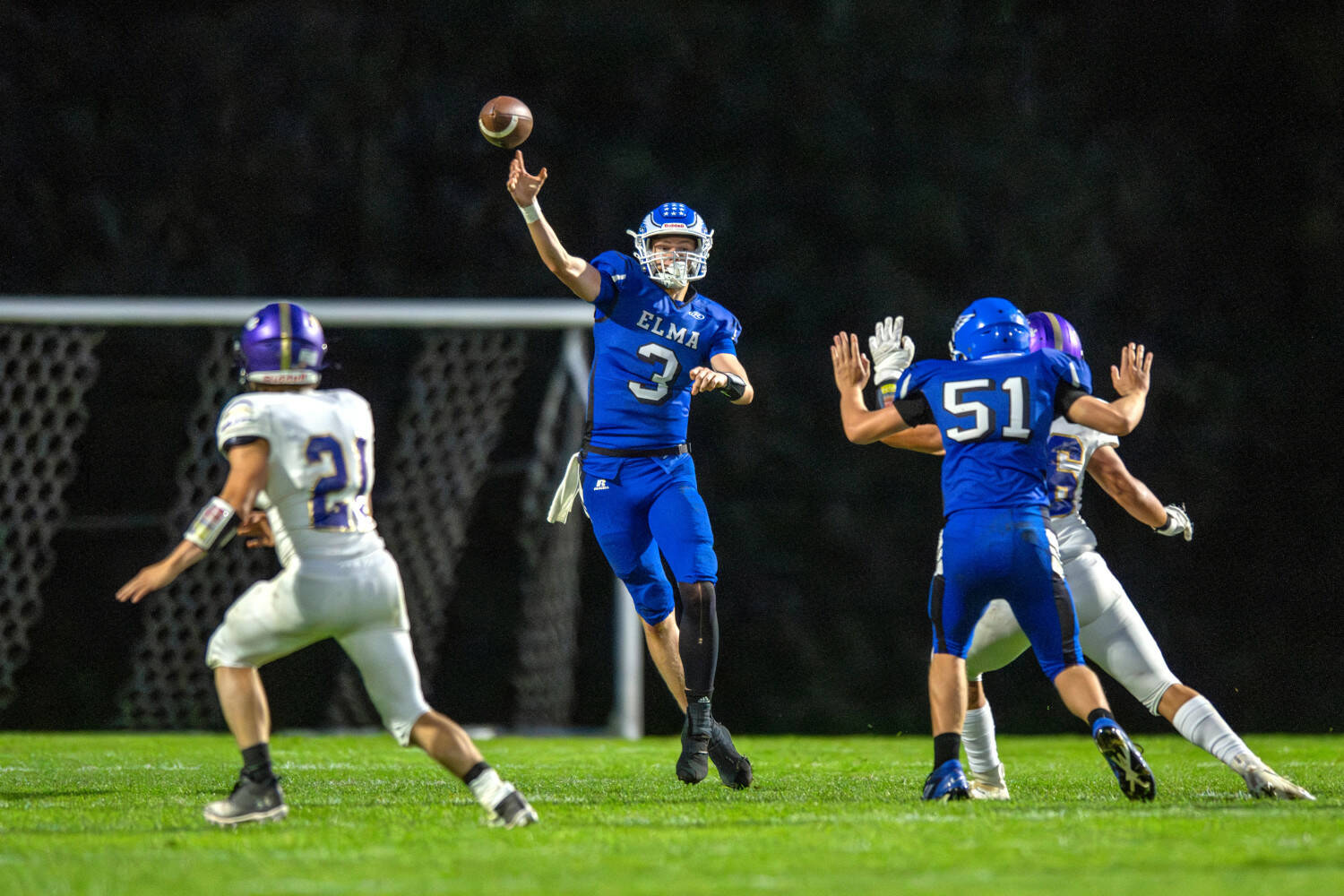 PHOTO BY FOREST WORGUM Elma quarterback Isaac McGaffey (3) throws a pass during a 28-7 loss to Sequim on Friday at Davis Field in Elma.