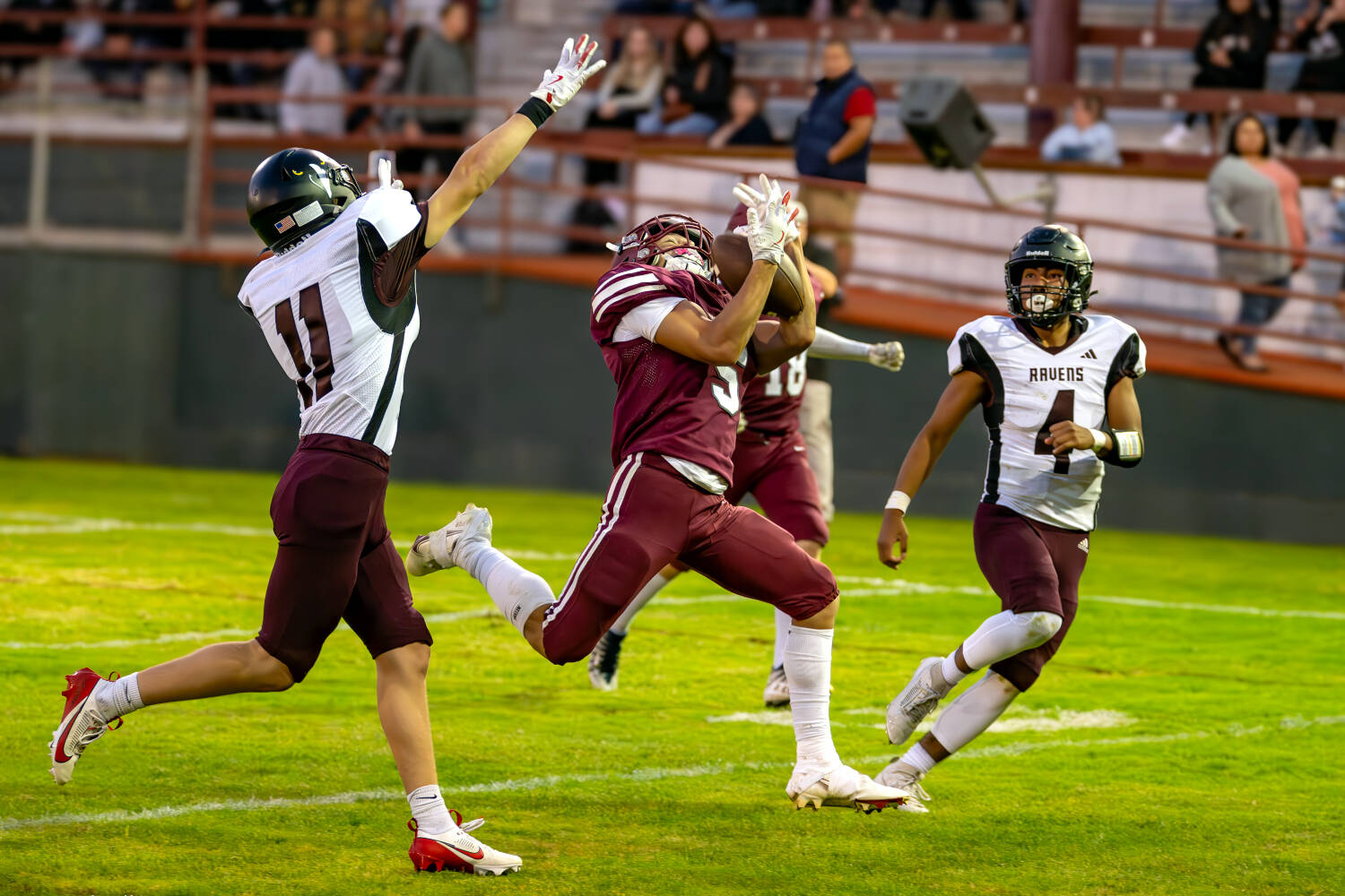 PHOTO BY JIM THRALL | MATFOCUS.COM Hoquiam running back Kingston Case (5) hauls in a pass during a 36-28 win over Raymond-South Bend on Friday at Olympic Stadium in Hoquiam.