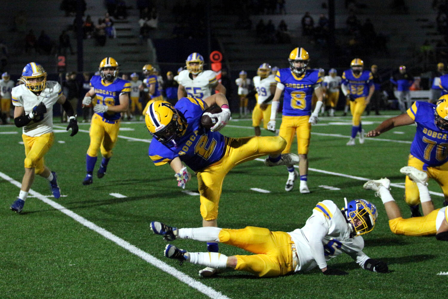 RYAN SPARKS | THE DAILY WORLD Aberdeen running back Legend Vessey (2) eludes the tackle of Rochester safety Carson Rotter (6) during a 33-7 loss on Friday at Stewart Field in Aberdeen.