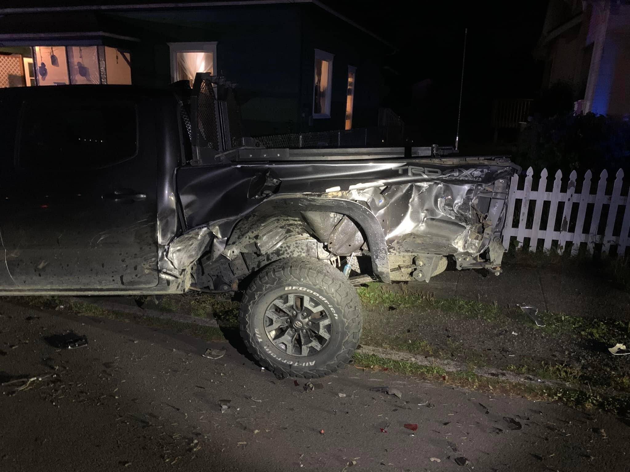 Damage from a crash involving a former mayor of Aberdeen is apparent on a parked car. (Courtesy photo / Josh Conway)