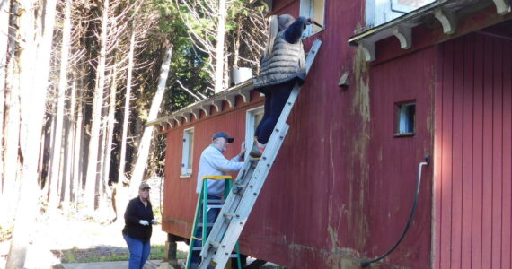 Museum of the North Beach photos
Volunteers paint the Museum of the North Beach’s 1912 Northern Pacific Railway caboose.