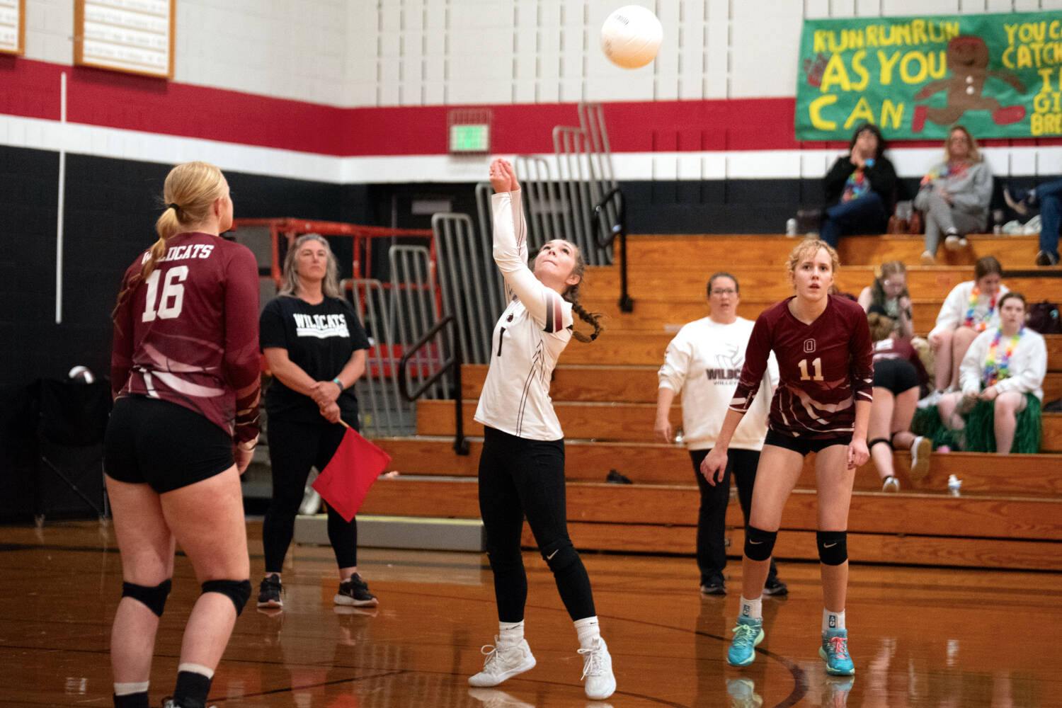 PHOTO BY VAN ADAM DAVIS Ocosta libero Noel Cuzdey (1) recorded 39 digs, a school record for digs in a match, to lead the Wildcats to a 3-1 win over North Beach on Wednesday in Westport.