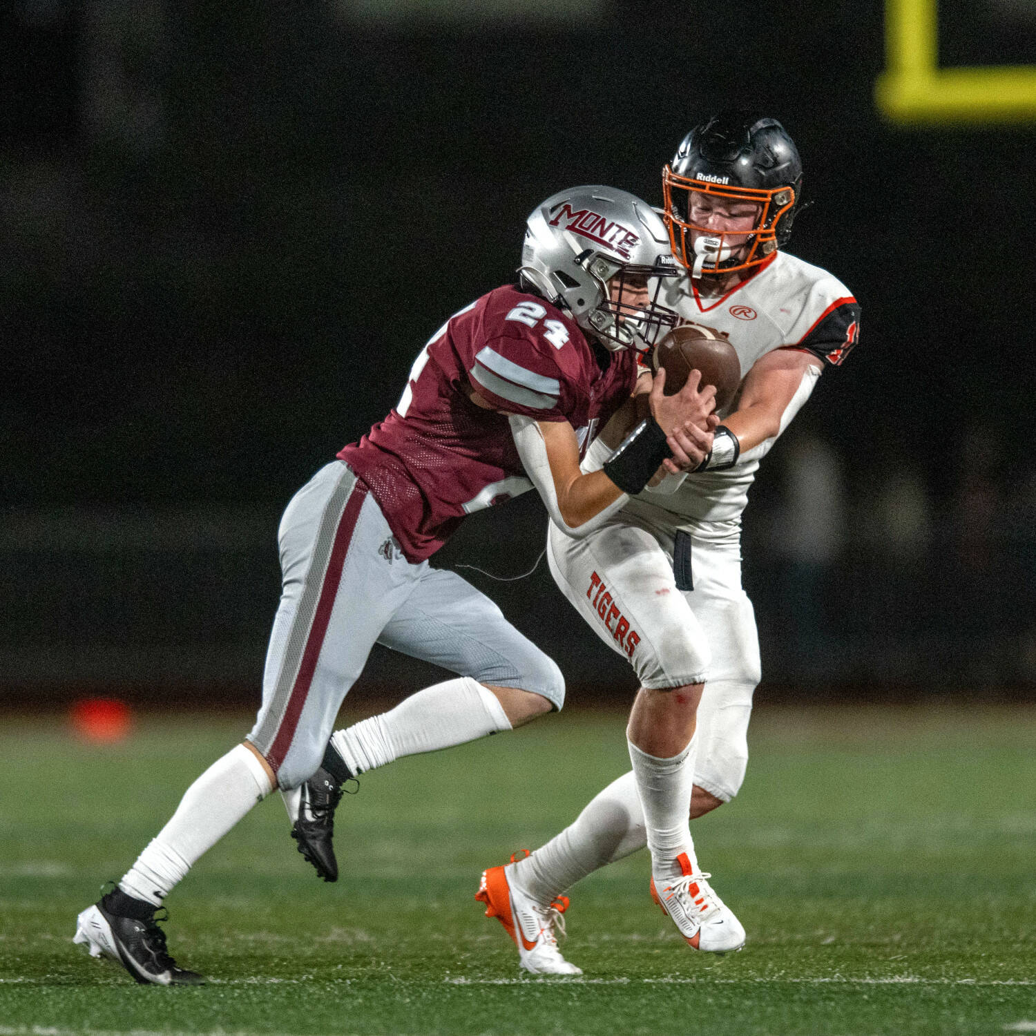 PHOTO BY FOREST WORGUM Montesano’s Kole Kjesbu (left) breaks up a pass intended for Napavine’s Colin Shields during the Bulldogs’ 35-19 victory on Friday in Montesano.