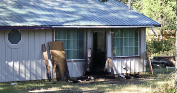 Charring from a small fire Thursday morning is evident on a Westport house. (Michael S. Lockett / The Daily World)