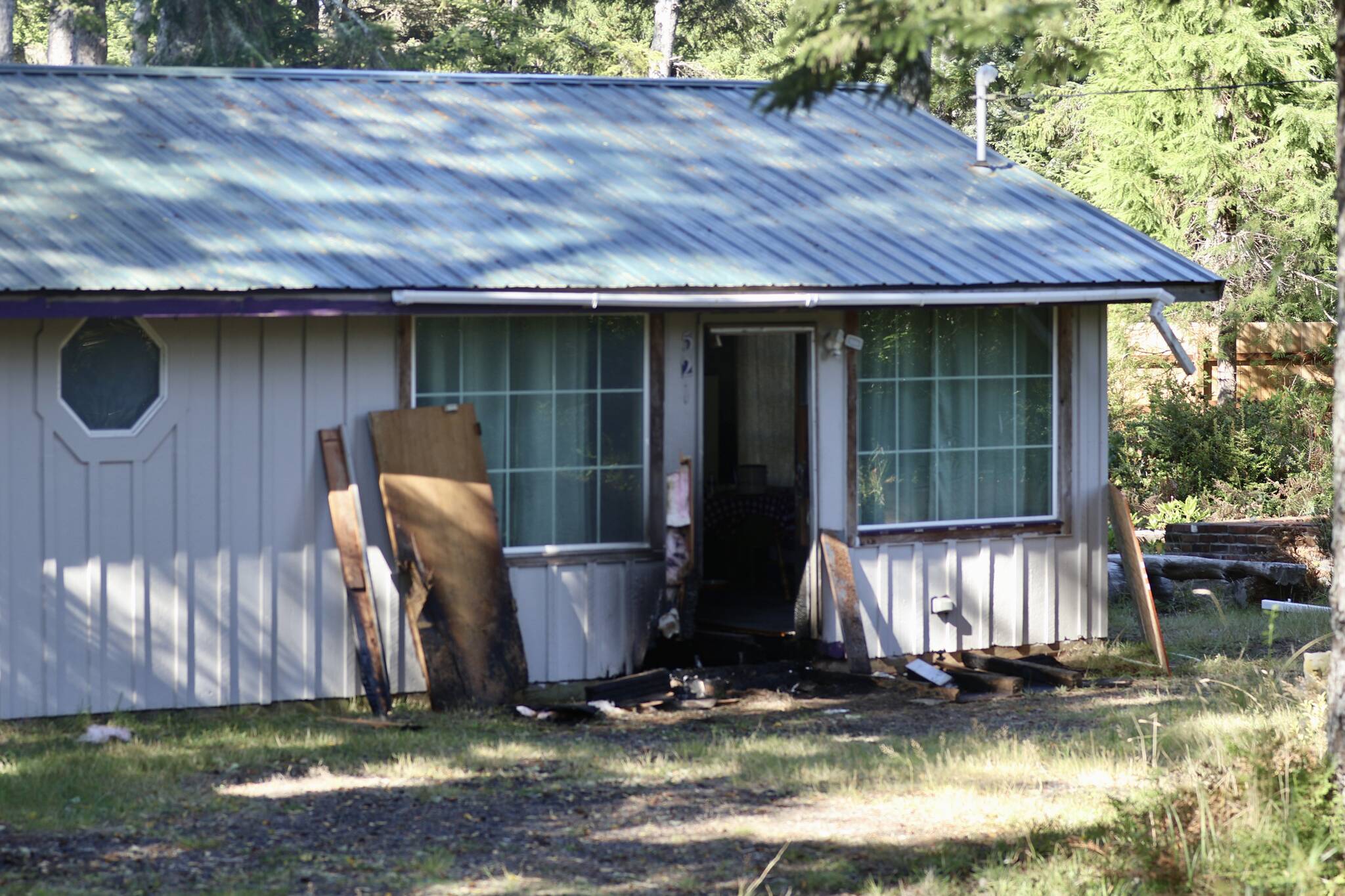 Charring from a small fire Thursday morning is evident on a Westport house. (Michael S. Lockett / The Daily World)