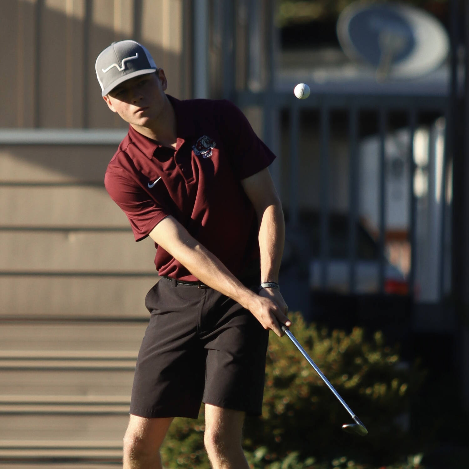 PHOTO BY HAILEY BLANCAS Montesano golfer Colton Grubb hits a chip shot en route to a low score of 39 in a match against Hoquiam on Thursday at the Oaksridge Golf Course in Elma.