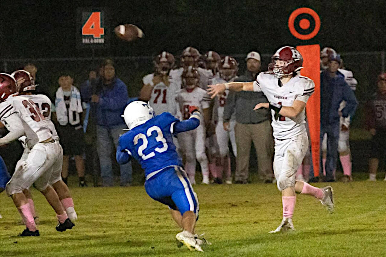 PHOTO BY PATTI REYNVAAN Hoquiam quarterback Joey Bozich (1) throws a pass during a 14-13 win over Toutle Lake on Friday at Toutle Lake High School.