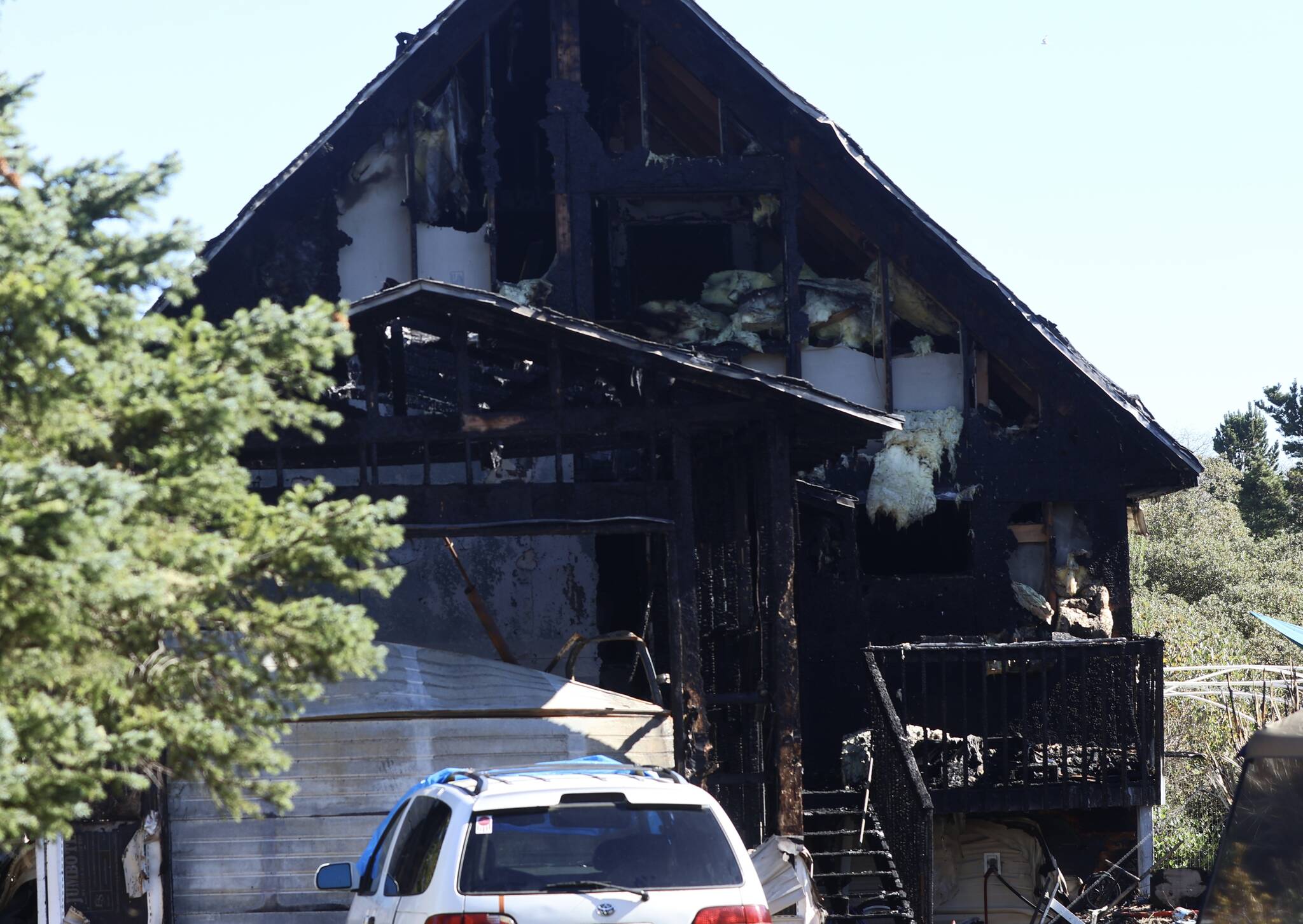 A fire devestated an Ocean Shores home on Sunday. (Michael S. Lockett / The Daily World)