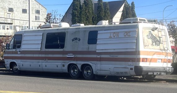 Matthew N. Wells / The Daily World
A recreational vehicle parked on East First Street in Aberdeen is a sore sight and stench for pedestrians who walk along the sidewalk. The RV, there for an unknown period of time, has often cluttered part of the sidewalk directly to the south of it. The city of Aberdeen wants to restrict RV parking time throughout Aberdeen. In order to make sure the city is on the right side of the law, it wants to “mirror” the city of Lacey, which already has such a program in place.