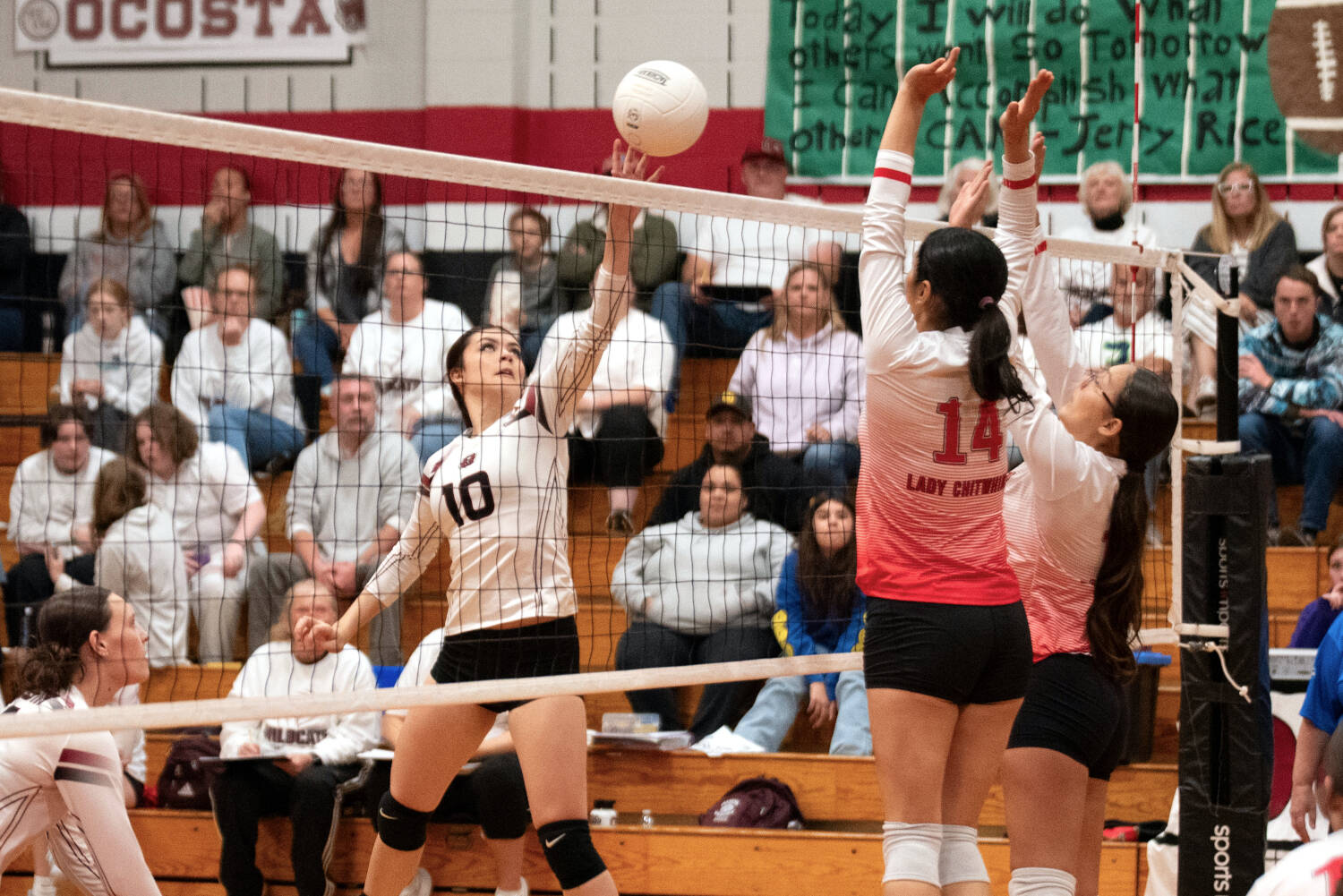 PHOTO BY VAN ADAM DAVIS Ocosta’s Veronica Gruber (10) puts a shot up over Taholah’s Nono McCrory (14) during the Wildcats’ 3-0 win on Thursday in Taholah.