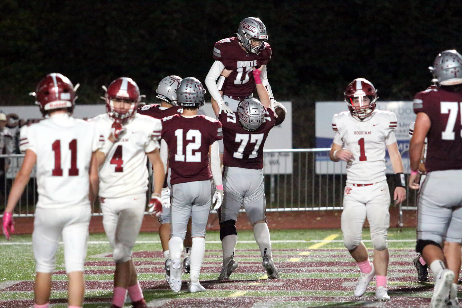 RYAN SPARKS | THE DAILY WORLD Montesano running back Gabe Pyhala (11) is raised in the air by lineman Logan Roberts (77) after scoring a touchdown in a 42-0 on Friday at Jack Rottle Field in Montesano.