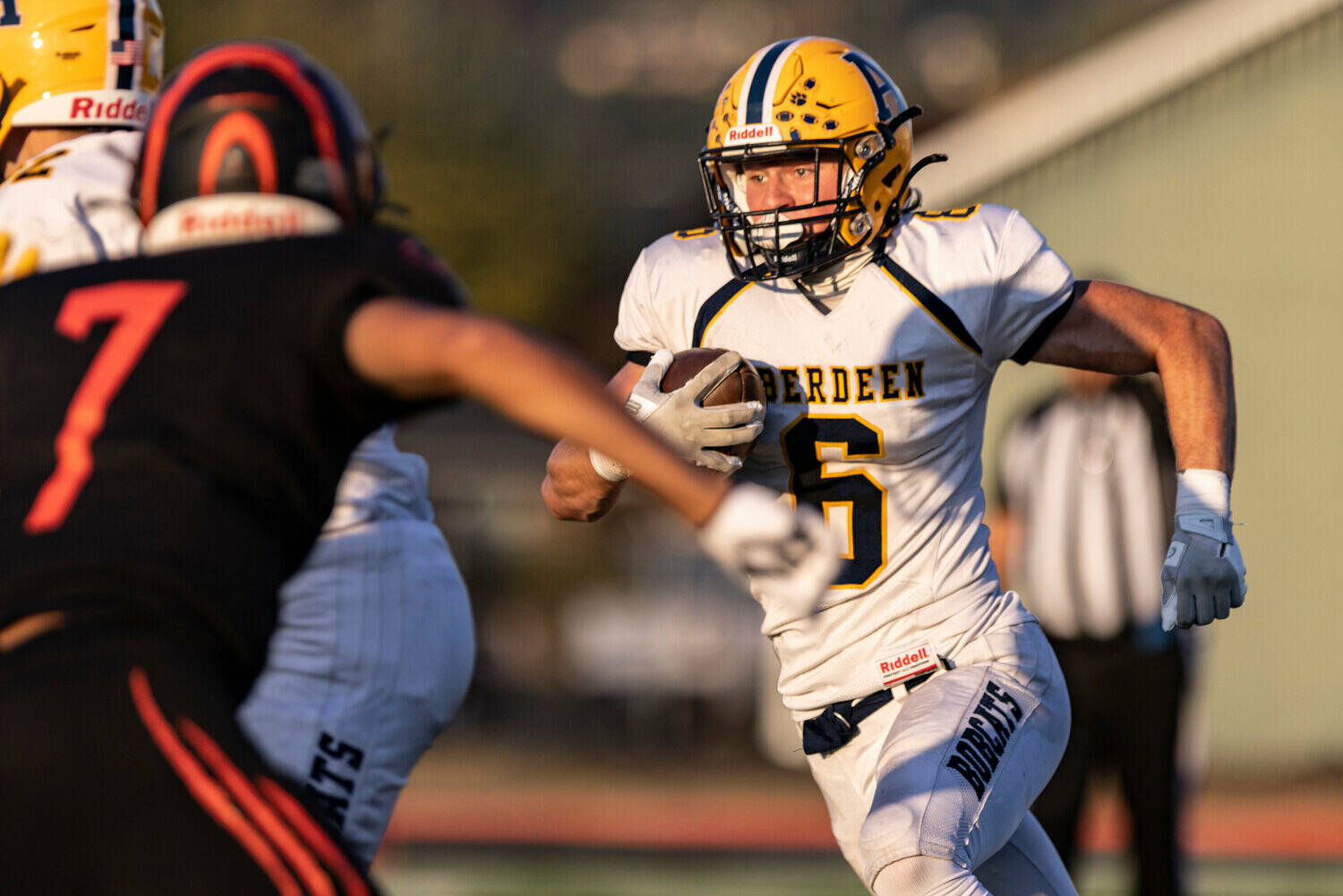 RIDLEY HUDSON | THE CHRONICLE Aberdeen running back Micah Schroeder (6) carries the ball during a 40-0 victory over Centralia on Saturday at Tiger Stadium in Centralia.