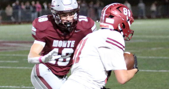 RYAN SPARKS | THE DAILY WORLD Montesano’s Mason Rasmussen (48) pursues Hoquiam’s Lincoln Niemi after Niemi recovered a fumble during the Bulldogs’ 42-0 win on Friday in Montesano.