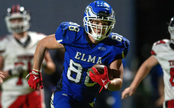 PHOTO BY FOREST WORGUM Elma’s Traden Carter scores on an interception return during a 27-16 win over Tenino on Friday at Elma High School.