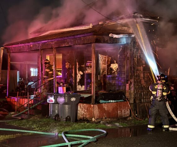 <p>Firefighters battle a structure fire in Aberdeen on Monday night. (Michael S. Lockett / The Daily World)</p>