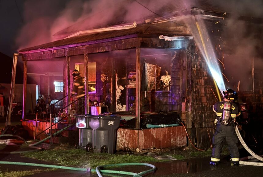 <p>Firefighters battle a structure fire in Aberdeen on Monday night. (Michael S. Lockett / The Daily World)</p>