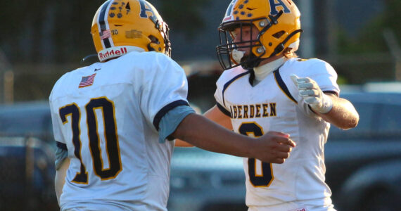 DAILY WORLD FILE PHOTO 
Aberdeen’s Micah Schroeder (right) and Andres Arias embrace during a game against Centralia on Oct. 12. The Bobcats face No. 1 Tumwater on Friday in Aberdeen.