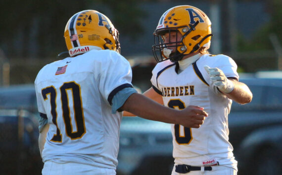 DAILY WORLD FILE PHOTO 
Aberdeen’s Micah Schroeder (right) and Andres Arias embrace during a game against Centralia on Oct. 12. The Bobcats face No. 1 Tumwater on Friday in Aberdeen.