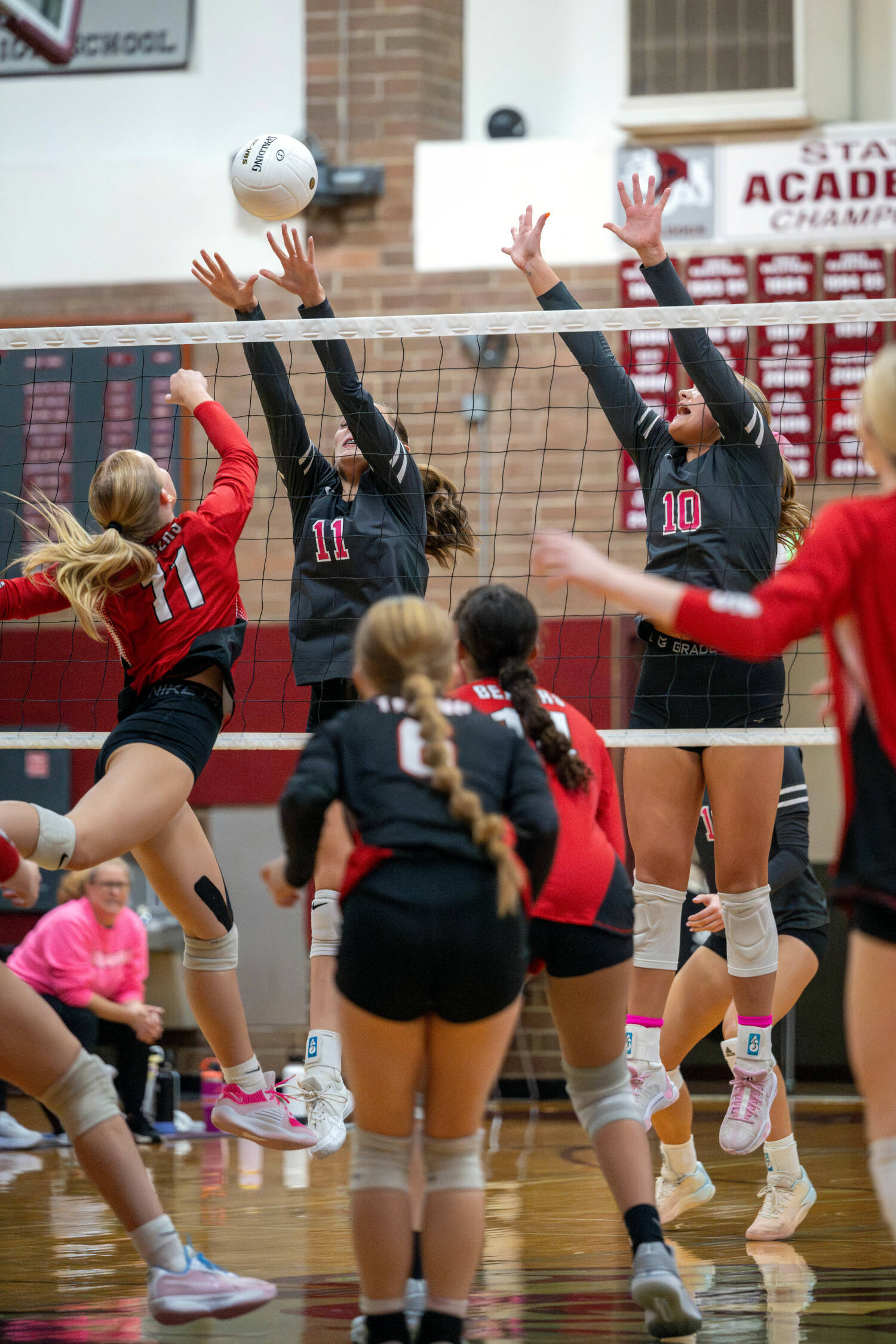 PHOTO BY FOREST WORGUM Montesano’s Violet Prince (11) and Kaila Hatton (10) make a play at the net during a 3-0 win over Tenino on Tuesday at Montesano High School.