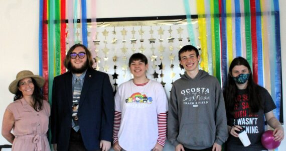 Maiden Voyage
Founder and President Andrea Mirante, far left, poses with kids during the open house for Maiden Voyage, a youth center which opened in Westport, on Oct. 13.