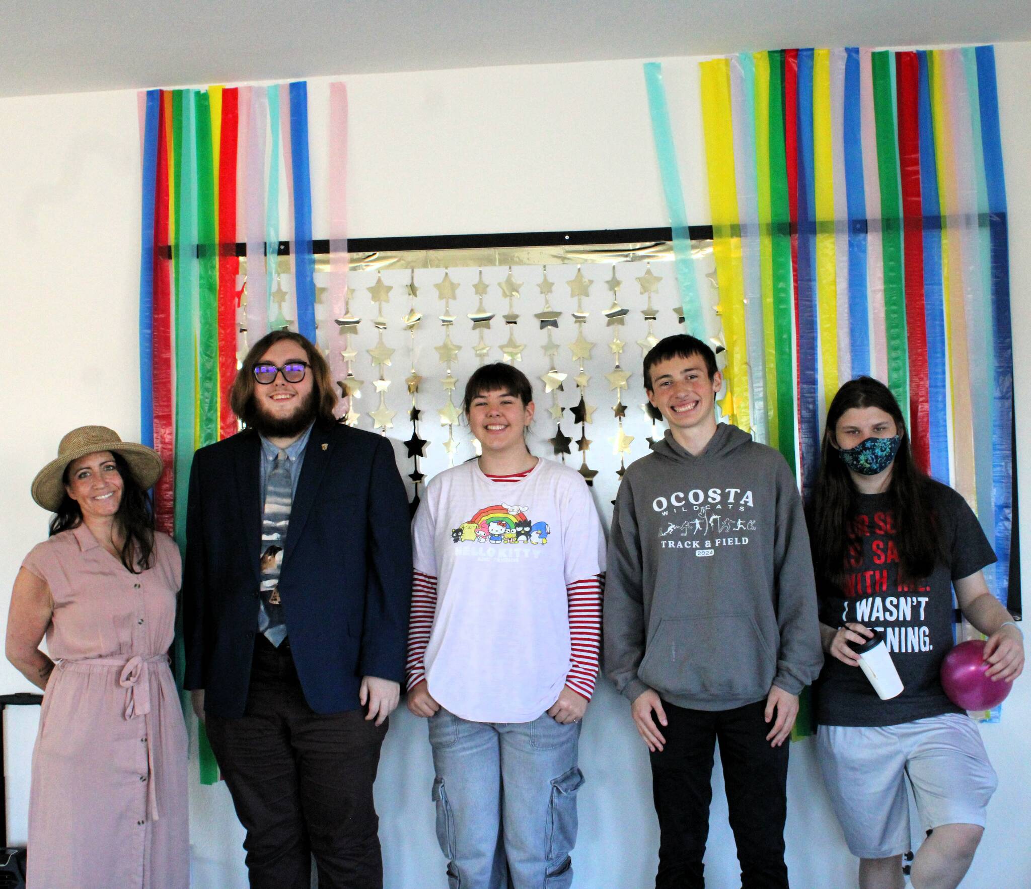 Founder and President Andrea Mirante, far left, poses with kids during the open house for Maiden Voyage, a youth center which opened in Westport, on Oct. 13. (Maiden Voyage)