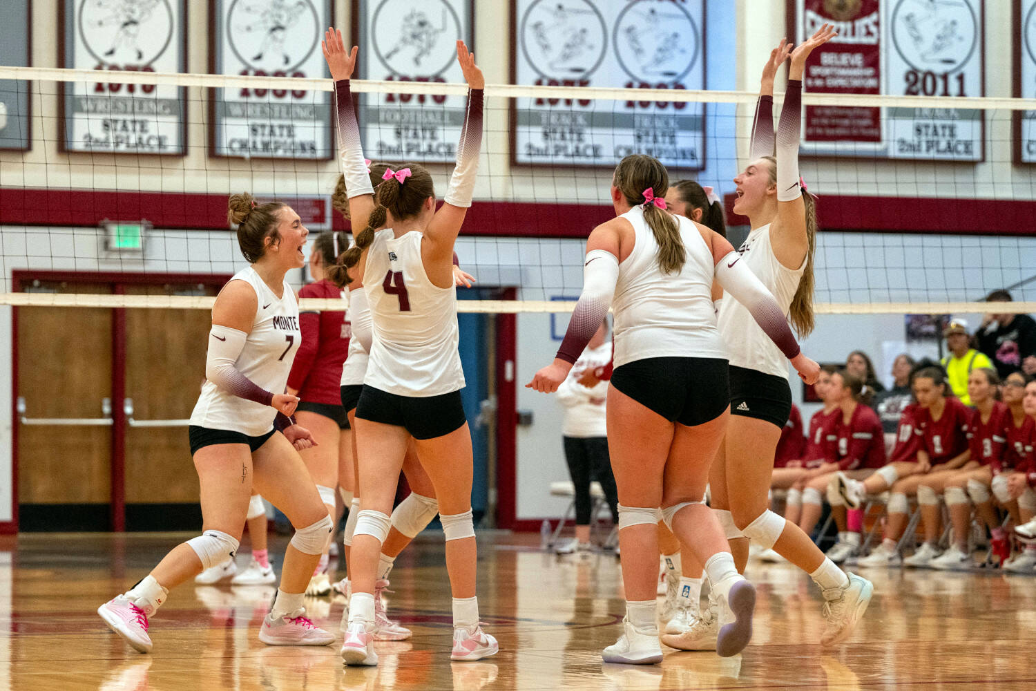 PHOTO BY FOREST WORGUM The Montesano Bulldogs celebrate a point during a straight-set victory over Hoquiam on Thursday at Hoquiam High School.