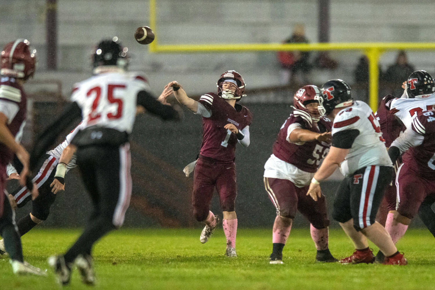 PHOTO BY FOREST WORGUM Hoquiam quarterback Joey Bozich throws a pass during a 36-7 loss to Tenino on Friday at Olympic Stadium in Hoquiam.