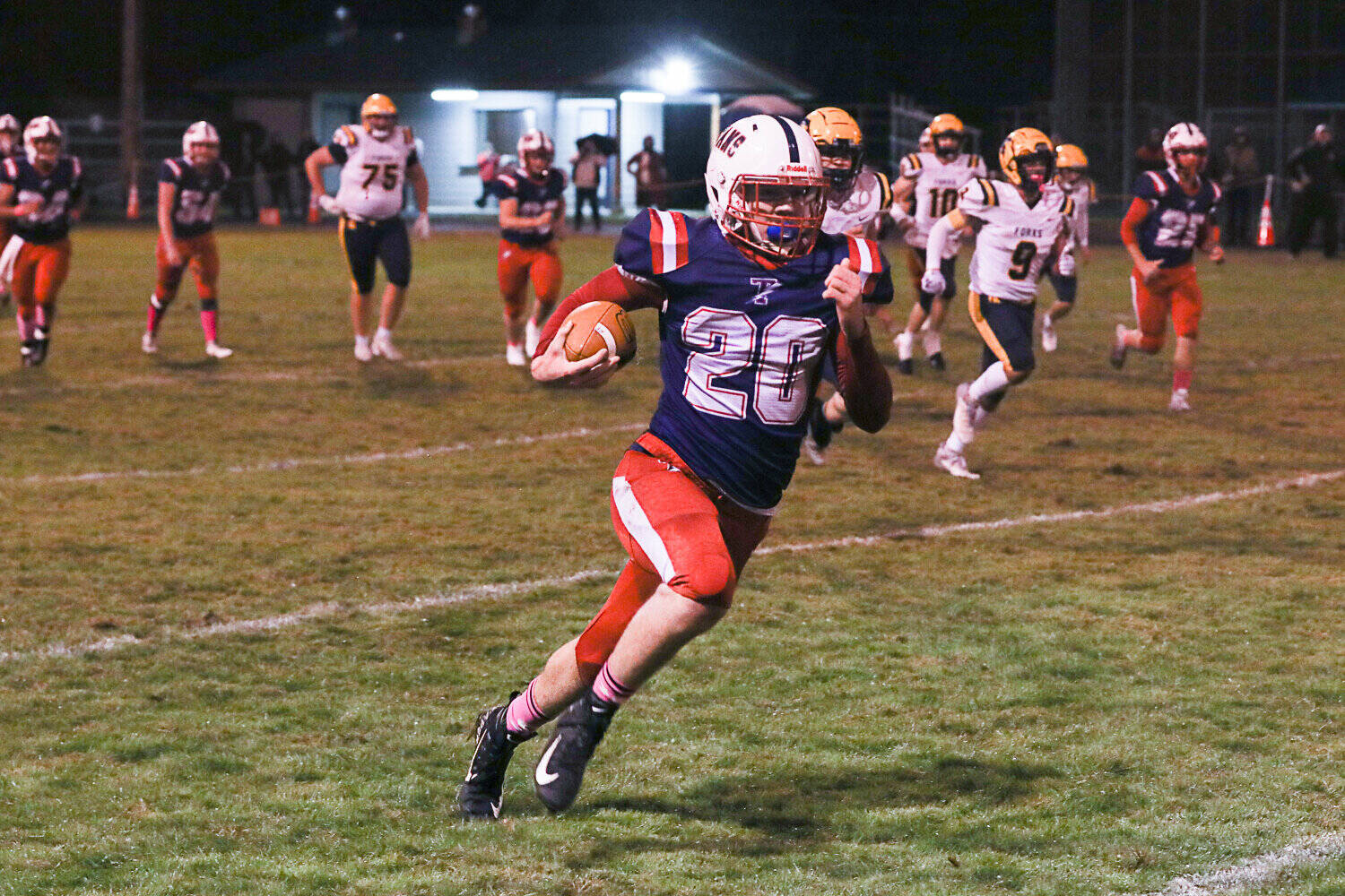 DYLAN WILHELM | THE CHRONICLE PWV running back Cody Strozyk races up the sideline during a 34-6 win over Forks on Friday in Pe Ell.