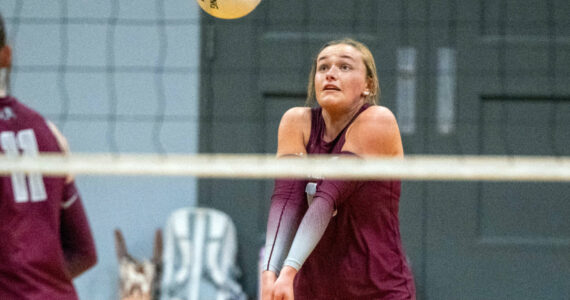 PHOTO BY FOREST WORGUM 
Montesano senior Kaila Hatton digs the ball during the Bulldogs’ 3-0 victory over Rochester on Tuesday in Montesano.