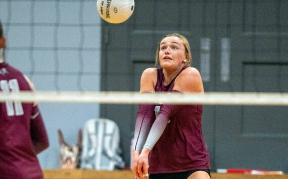 PHOTO BY FOREST WORGUM Montesano senior Kaila Hatton digs the ball during the Bulldogs’ 3-0 victory over Rochester on Tuesday in Montesano.