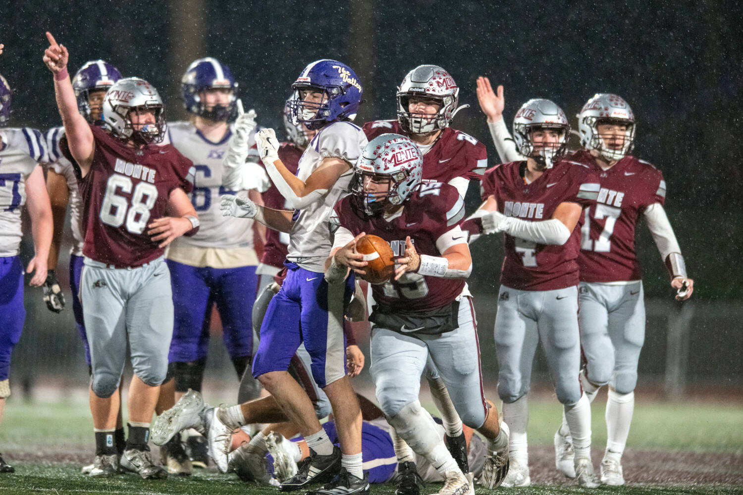 PHOTO BY FOREST WORGUM Montesano linebacker Felix Romero (15) recovers a fumble during a 34-28 win over top-ranked Nooksack Valley on Friday at Jack Rottle Field in Montesano.