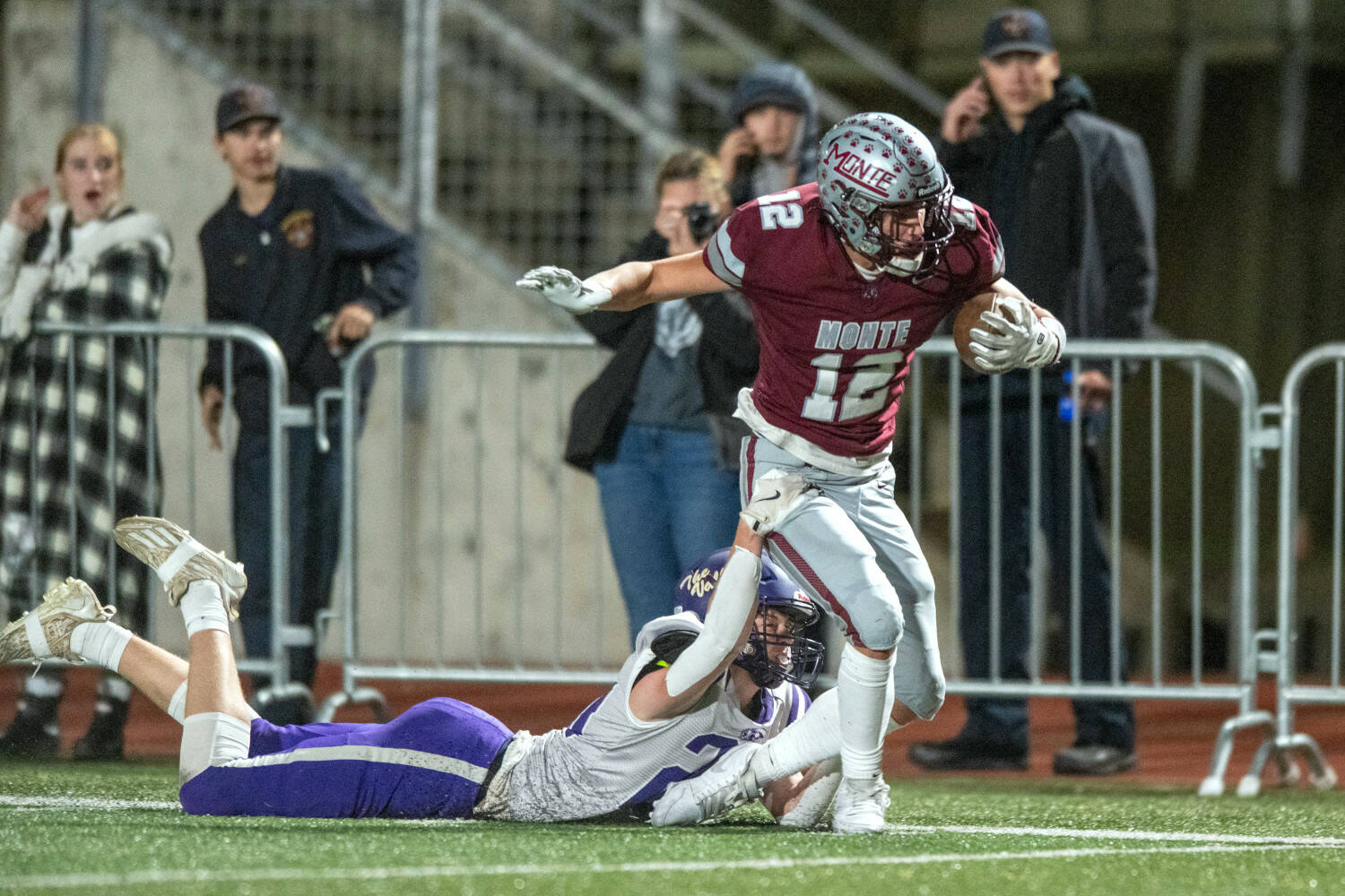 PHOTO BY FOREST WORGUM Montesano receiver Toren Crites (12) breaks a tackle during a 34-28 win over Nooksack Valley on Friday at Montesano High School.