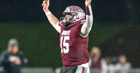 PHOTO BY FOREST WORGUM
Montesano linebacker Felix Romero reacts after securing a fumble in the fourth quarter of a victory over Nooksack Valley last week. Romero and the Bulldogs face Elma in the East County Civil War on Friday in Montesano.