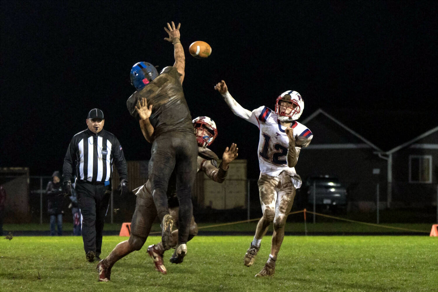 KODY CHRISTEN | THE CHRONICLE Pe Ell-Willapa Valley quarterback Nathan Fluke (12) throws a pass during a 14-0 loss to Adna on Thursday in Adna.